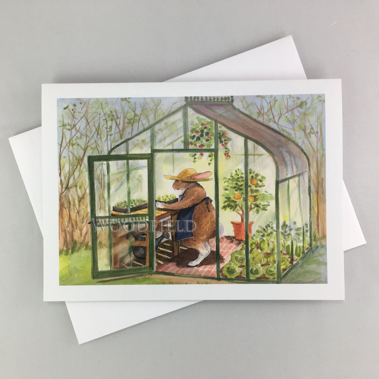 Green House Rabbit - Greeting Card by Woodfield Press